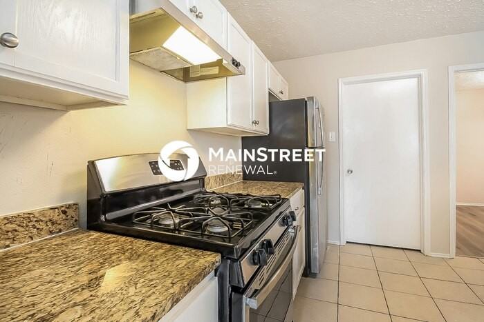 7003 Oakmantle Dr - Photo 5 of 16