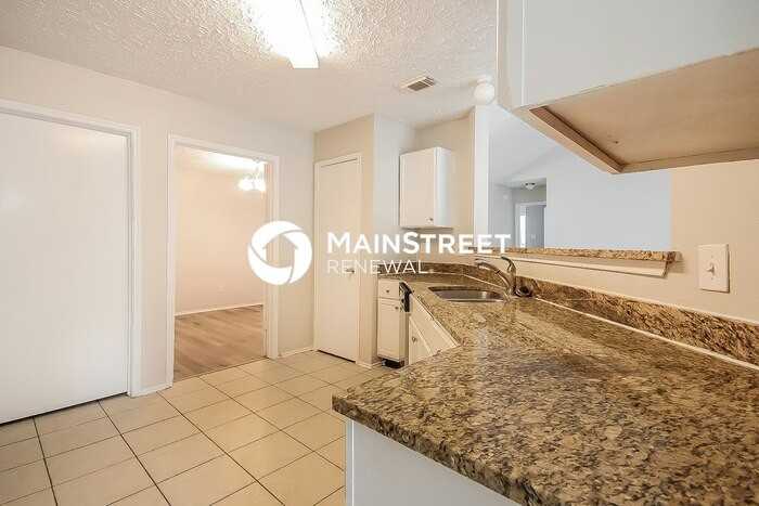 7003 Oakmantle Dr - Photo 6 of 16