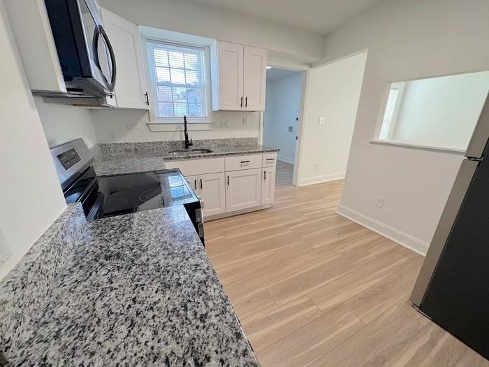 102 Cushing St - Photo 6 of 37