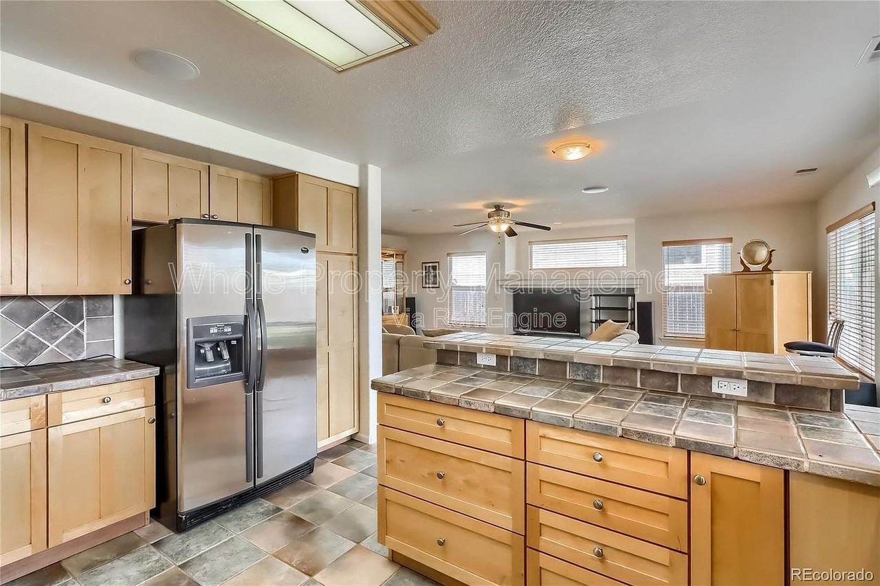 20721 E 40th Ave - Photo 6 of 35