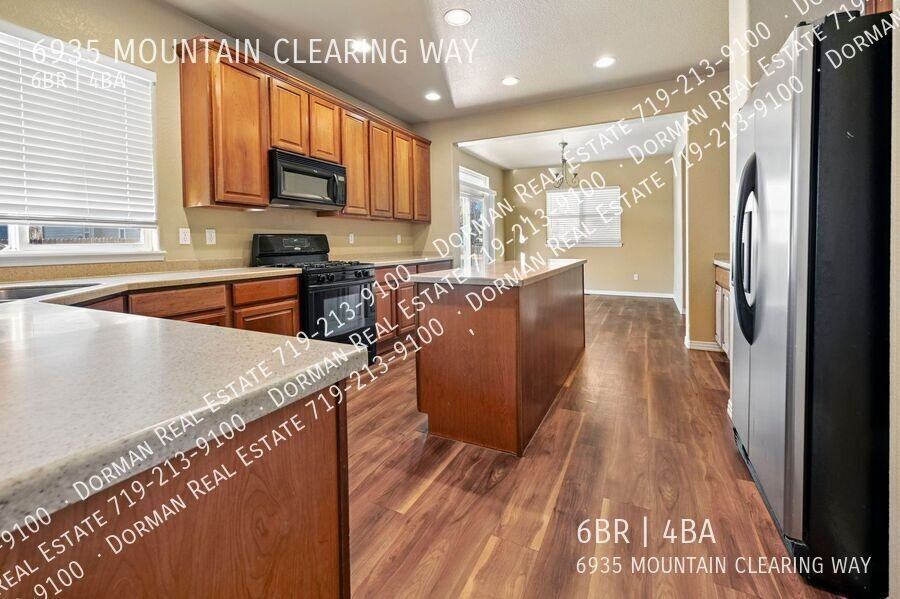 6935 Mountain Clearing Way - Photo 2 of 37