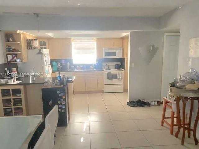 7340 Sw 82nd St #C203 - Photo 2 of 6