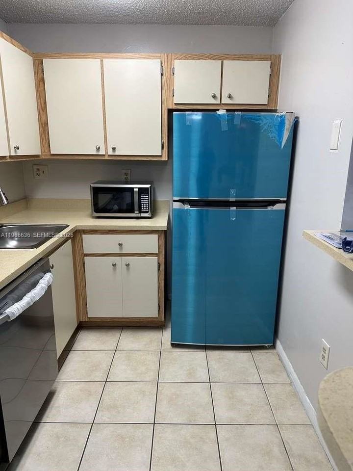 7160 Nw 179th St #309 - Photo 4 of 8