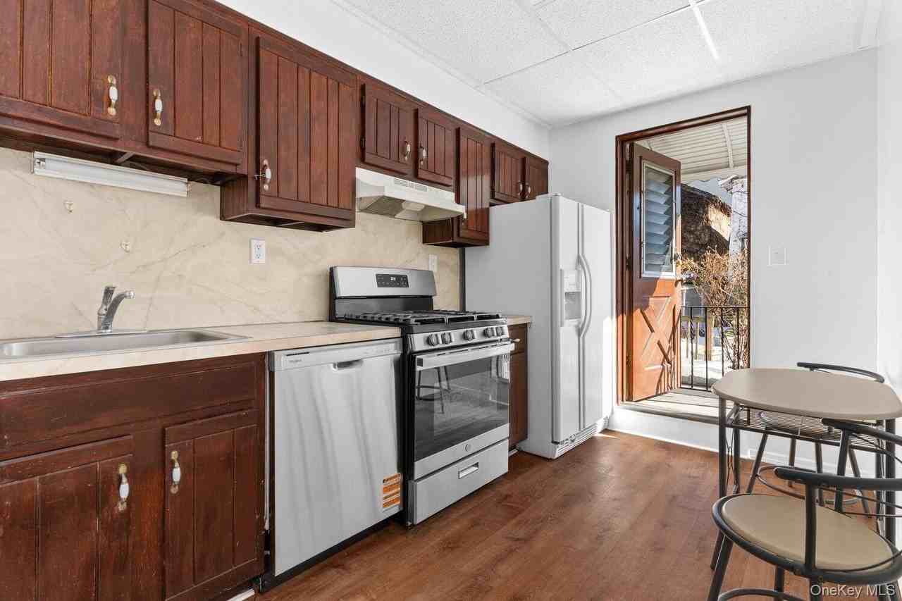 6048 Flushing Ave Unit 1 #1 - Photo 2 of 7