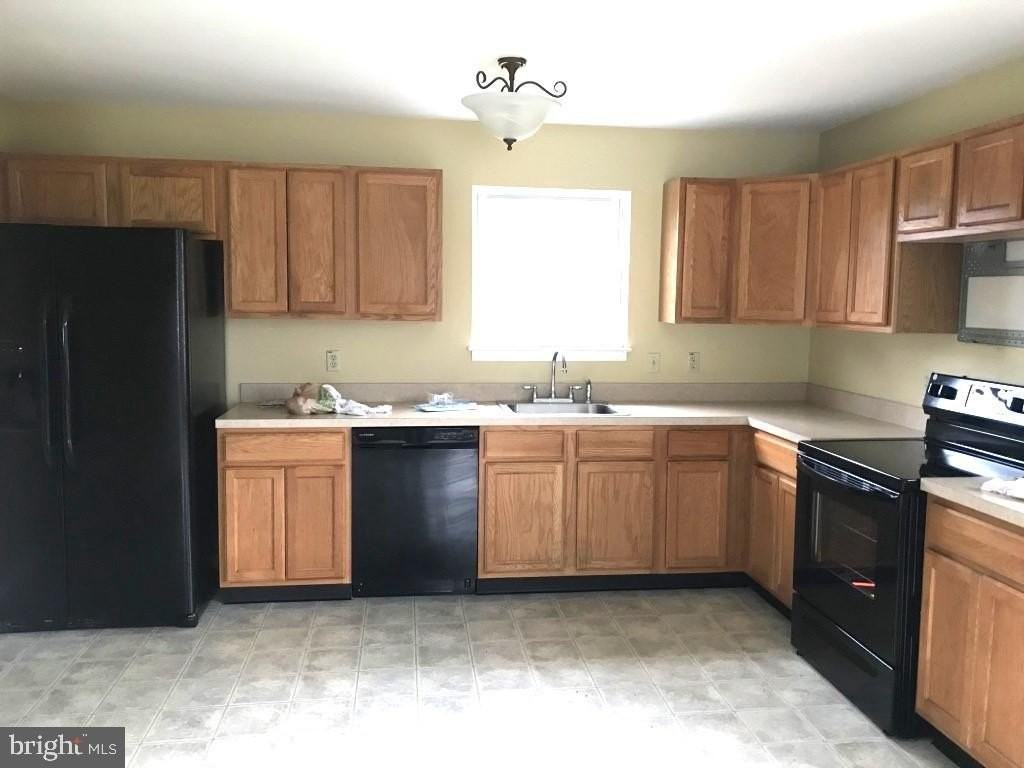 4877 Stump Rd - Photo 4 of 10