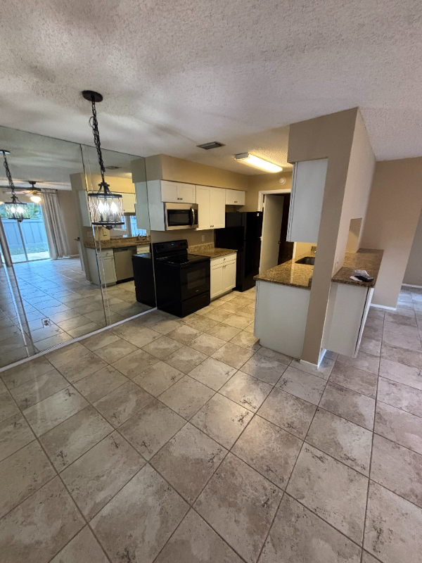 3999 Nw Cinnamon Tree Cir #3999 - Photo 3 of 17