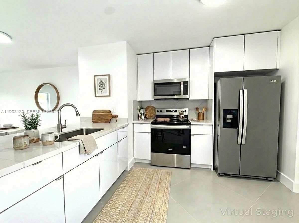 15969 Nw 64th Ave #313 - Photo 2 of 18