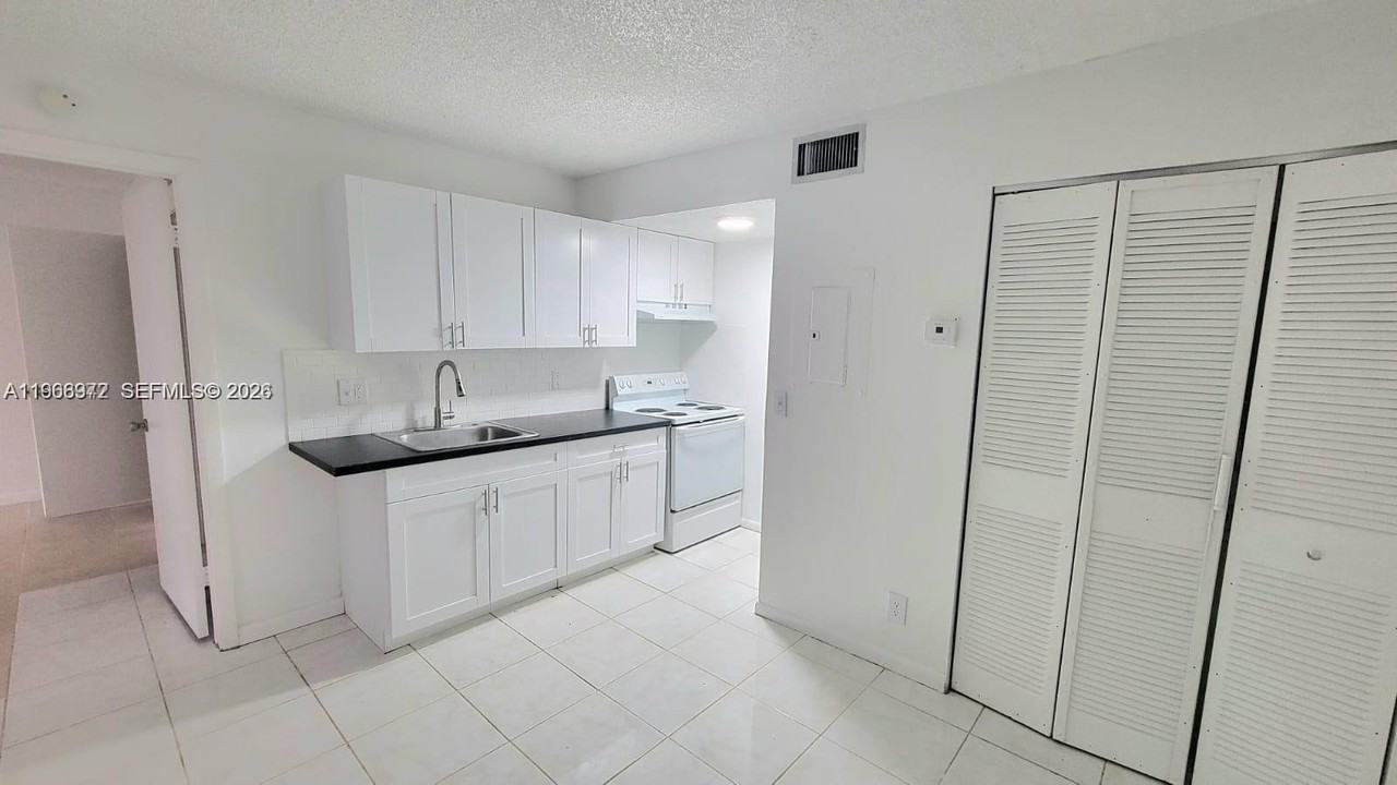 2042 Nw 43rd Ter #1 - Photo 3 of 7