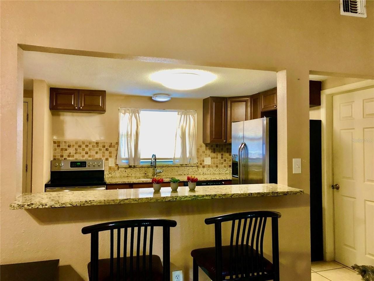 7537 Jasmine Blvd - Photo 6 of 15