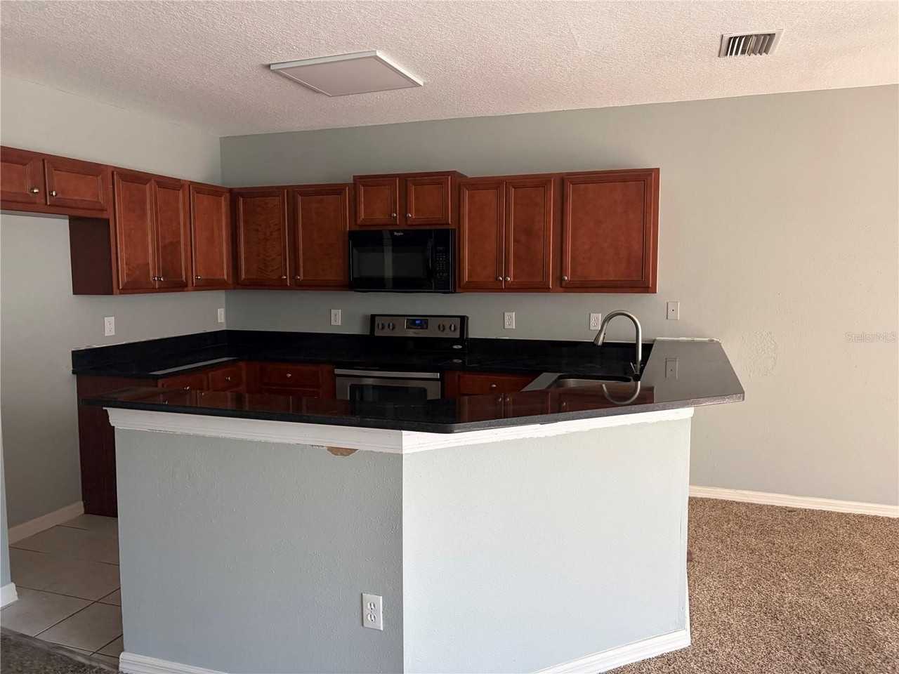 9609 Carlsdale Dr - Photo 2 of 4