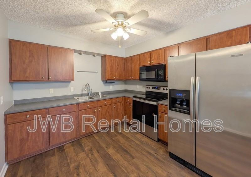 7636 Mccowan Dr - Photo 4 of 18