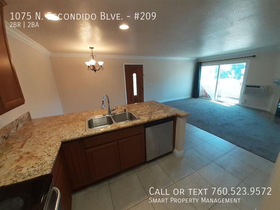 1075 N Escondido Blvd #209 - Photo 3 of 12