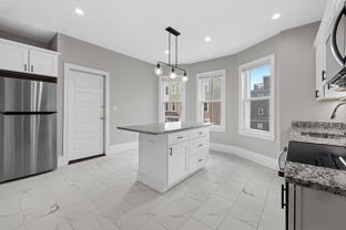 921-923 E Broadway 3 - Photo 1 of 1