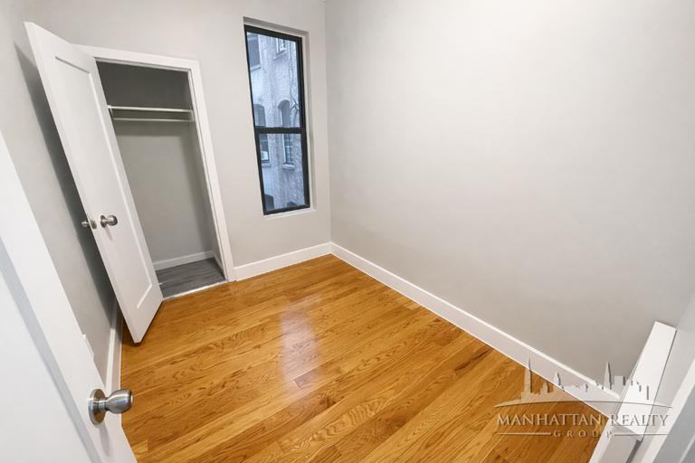 E 11th St #16 - Photo 2 of 4