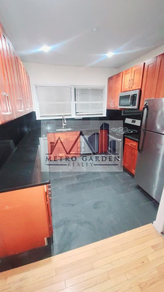 39-30 214th Place #2 - Photo 2 of 10