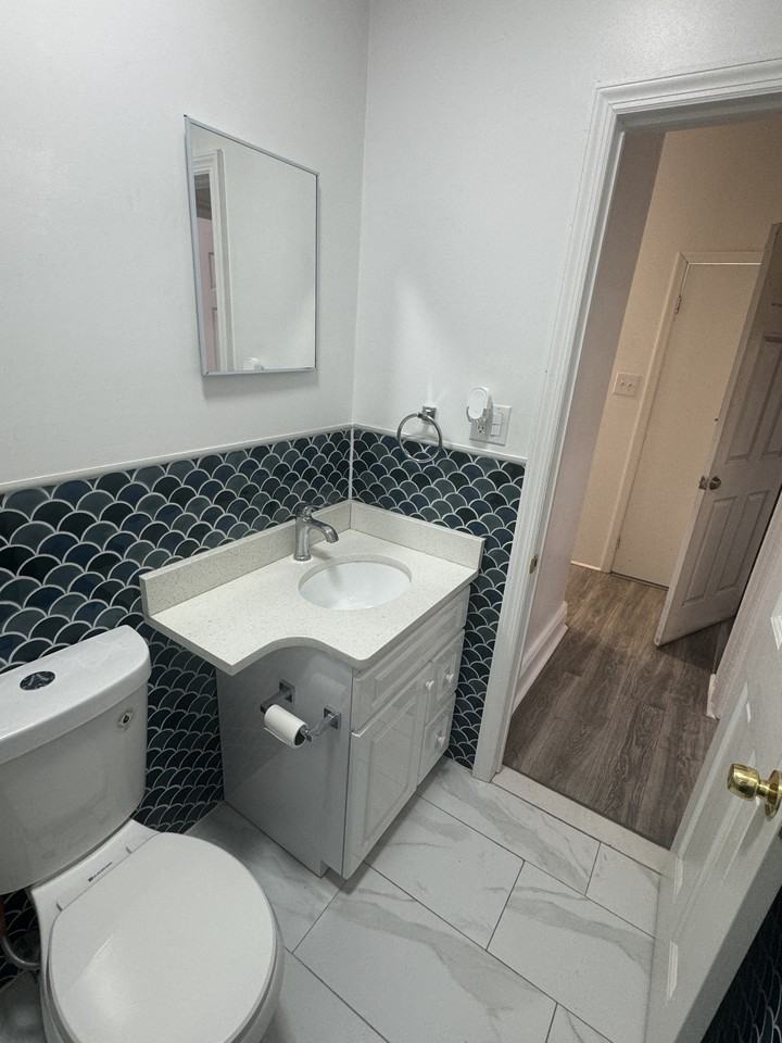 10715 103rd St #1stFL - Photo 4 of 8