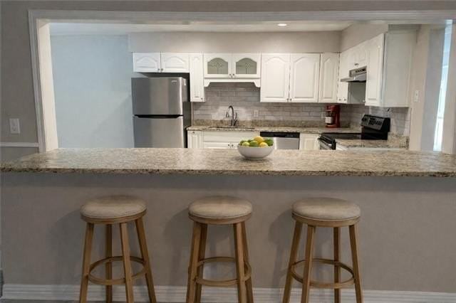 7012 Tullis Dr - Photo 4 of 21