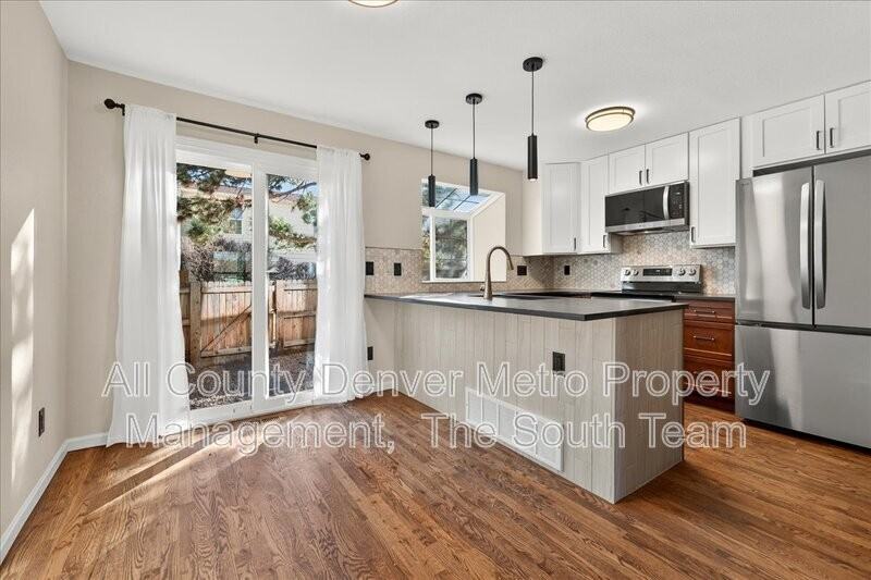 7635 S Steele St - Photo 6 of 27