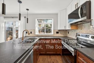 7635 S Steele St - Photo 1 of 1