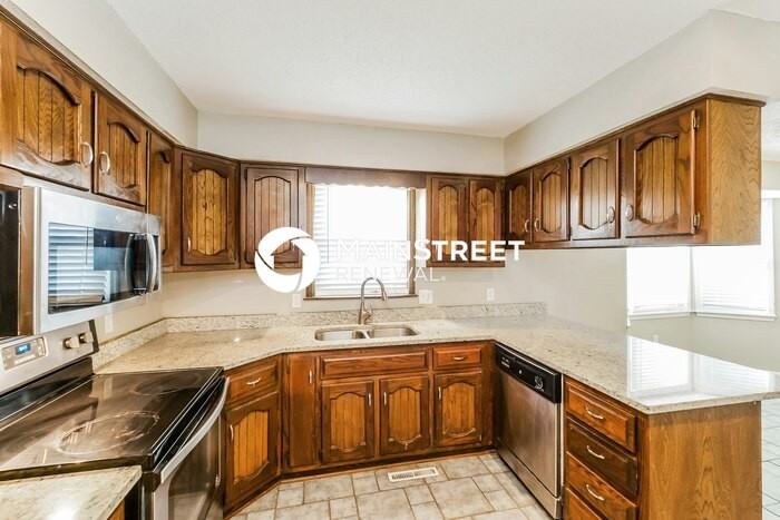 14008 S Raintree Dr - Photo 5 of 19