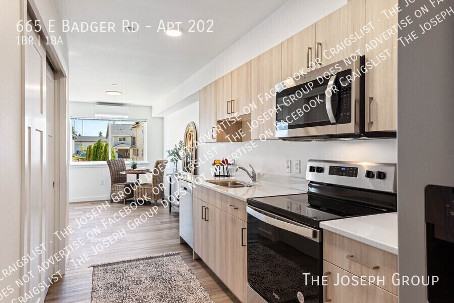 665 E Badger Rd #202 - Photo 7 of 19