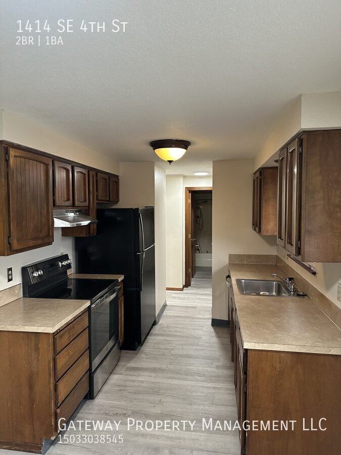 1414 Se 4th St - Photo 5 of 12