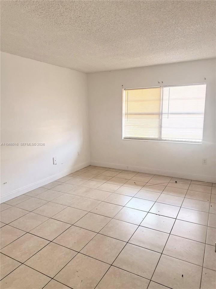611 Nw 177th St #201-208 - Photo 4 of 6