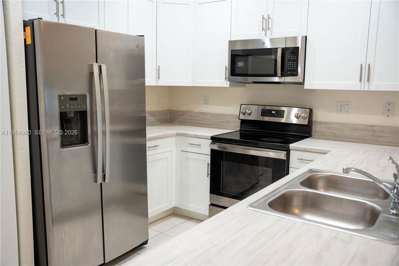 11091 W 32nd Ln - Photo 2 of 8