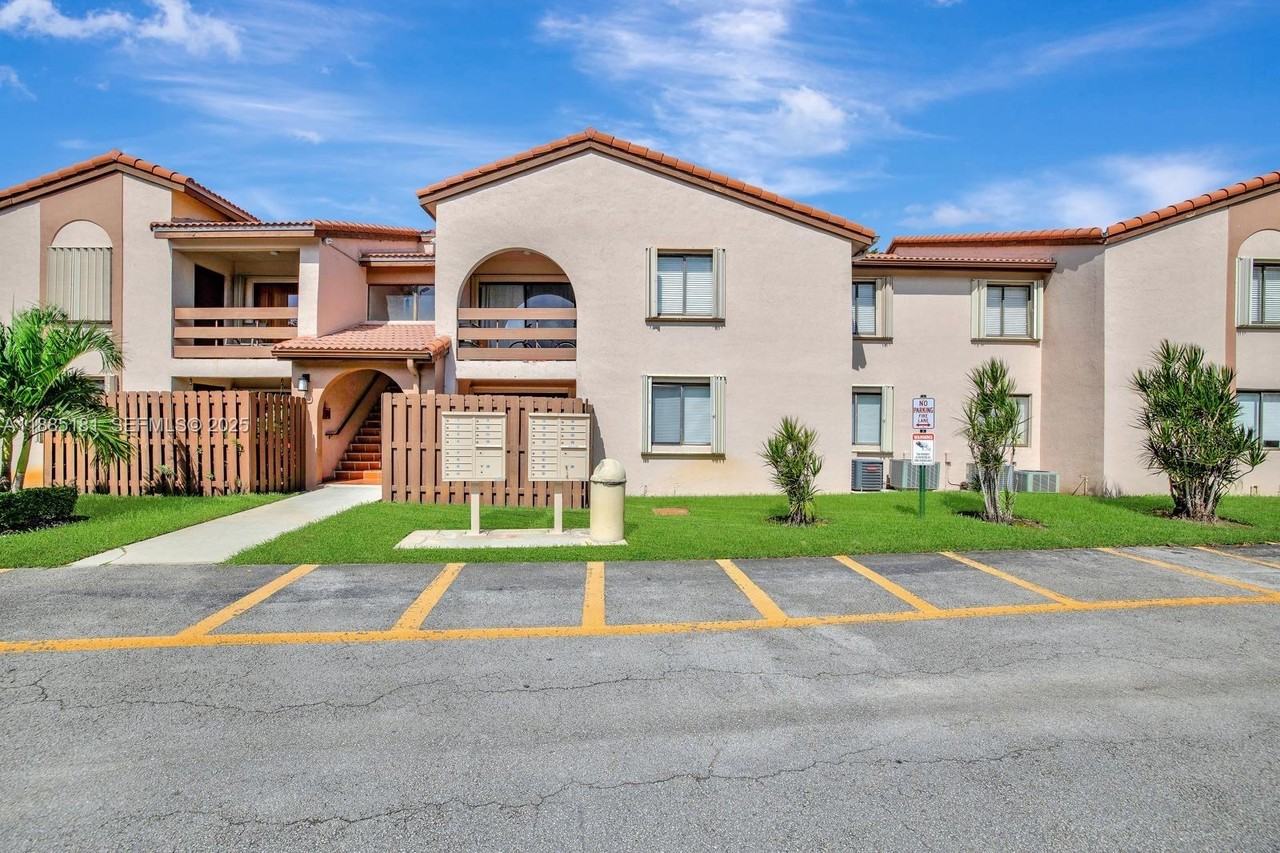 8999 Southwest 123rd Court ##107 - Photo 2 of 14