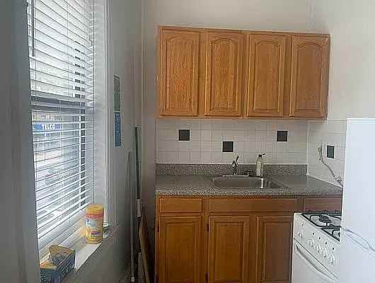 6093 Myrtle Ave #3F - Photo 2 of 5