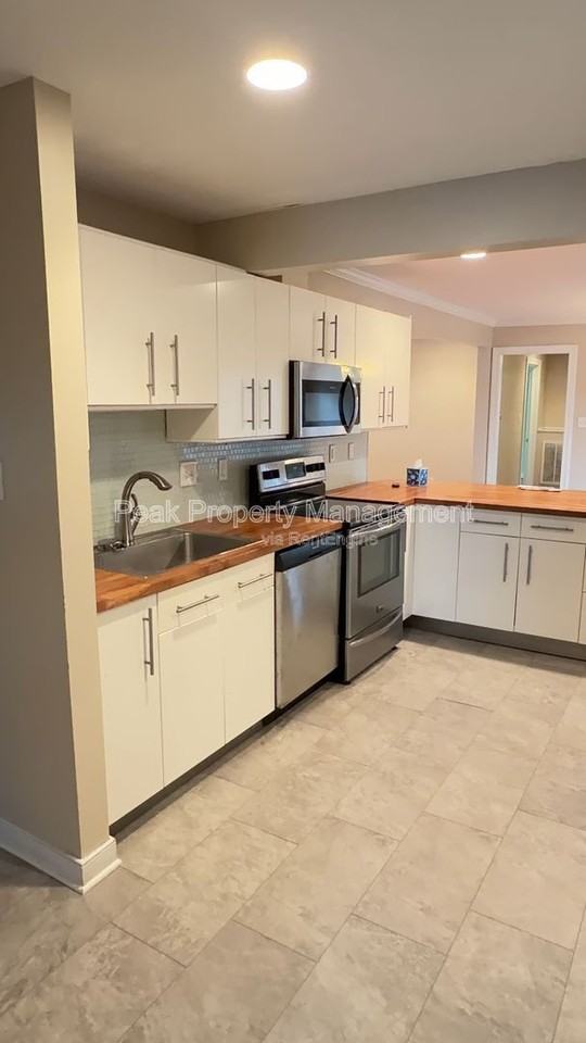 7100 Brigham Rd - Photo 4 of 5