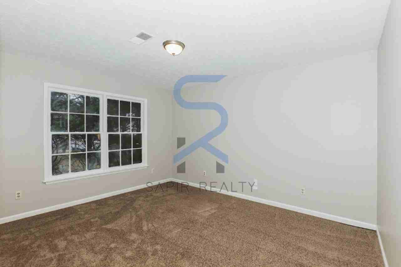 6682 Chupp Rd Apt D - Photo 5 of 12