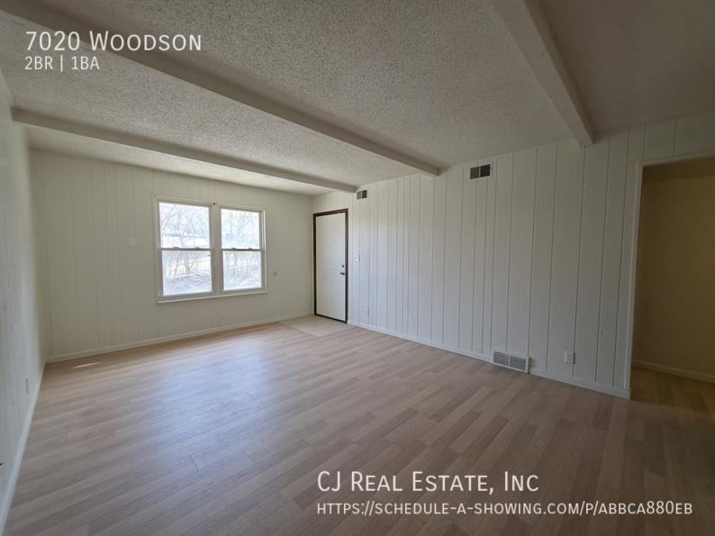 7020 Woodson Rd - Photo 2 of 11