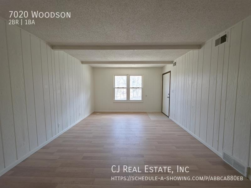 7020 Woodson Rd - Photo 3 of 11