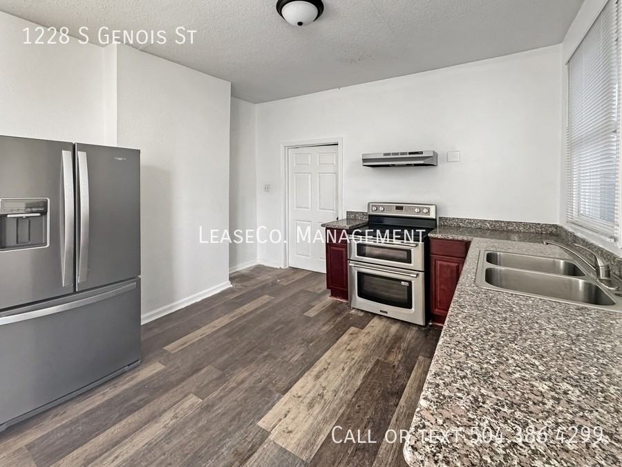 1228 S Genois St - Photo 3 of 11