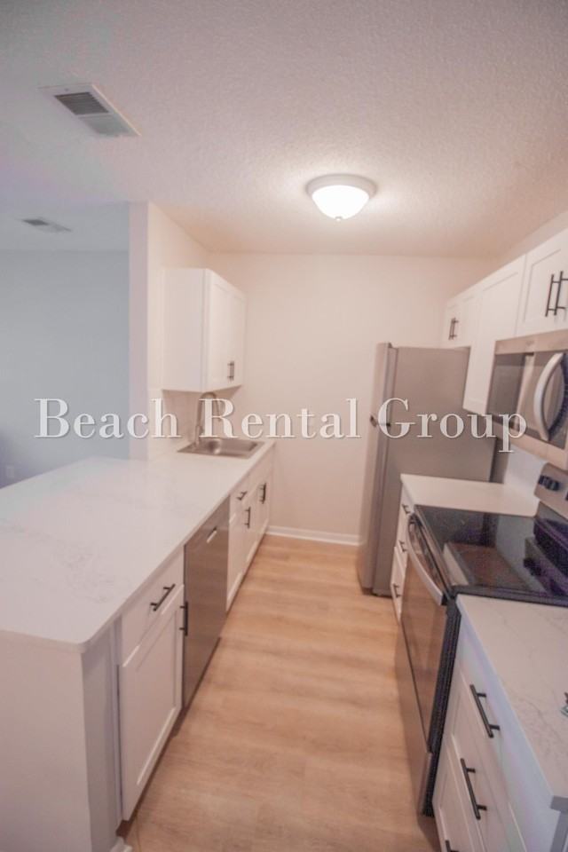 6840 Blue Heron Blvd - Photo 4 of 15