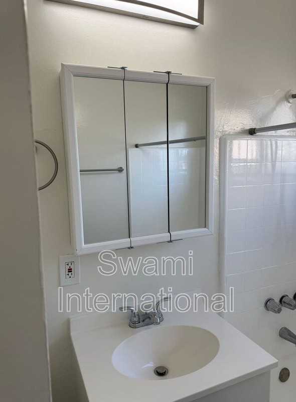 1102 1/2 W 92nd St - Photo 2 of 13