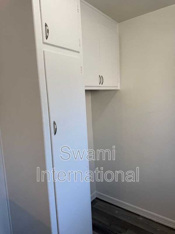 1102 1/2 W 92nd St - Photo 3 of 13