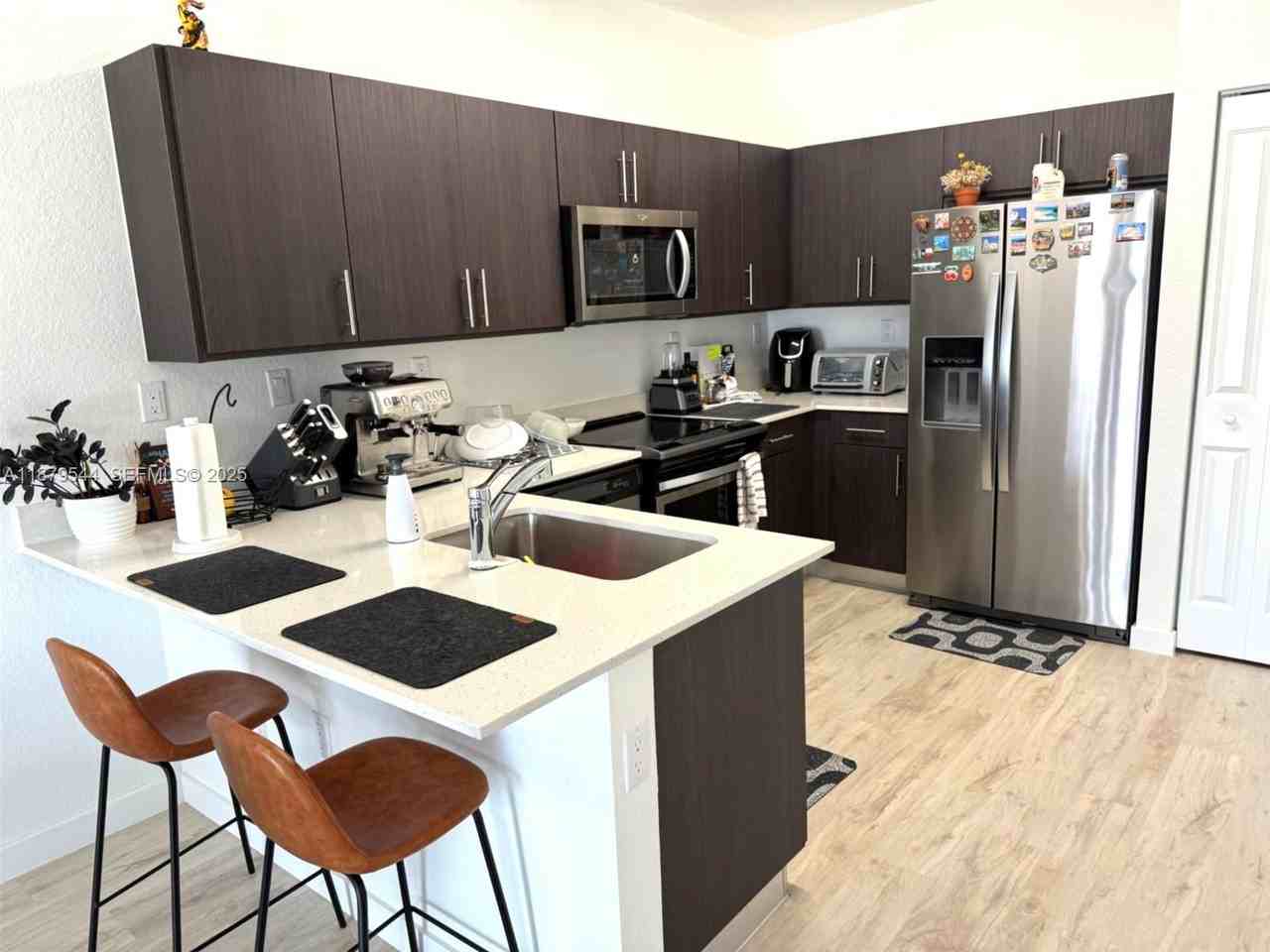 15560 Southwest 136th Street ##209 - Photo 2 of 20