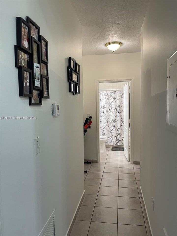 7500 West 20th Avenue ##202 - Photo 6 of 25