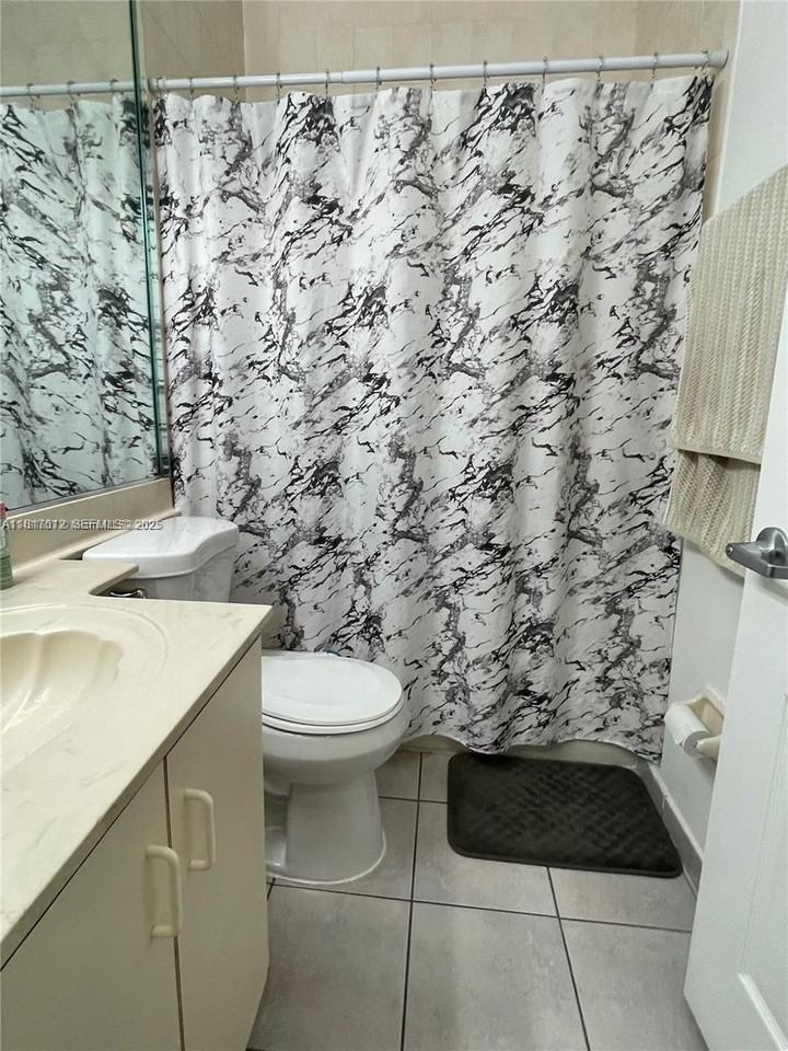 7500 West 20th Avenue ##202 - Photo 7 of 25