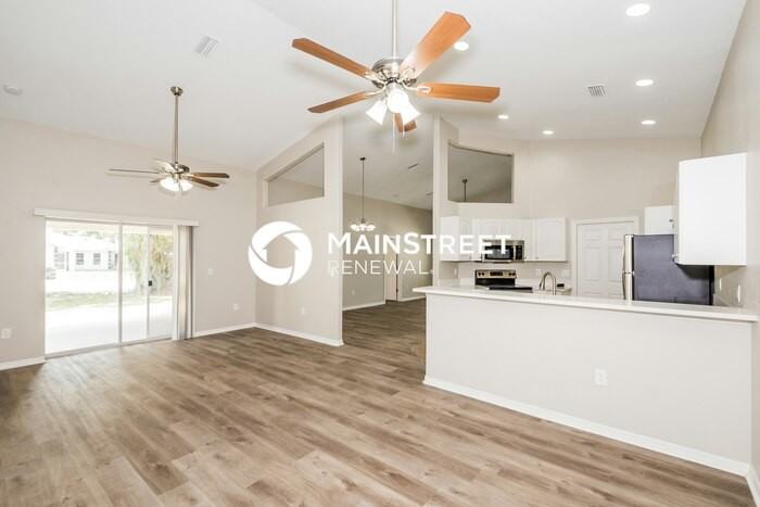 9310 27th Ave E - Photo 4 of 16