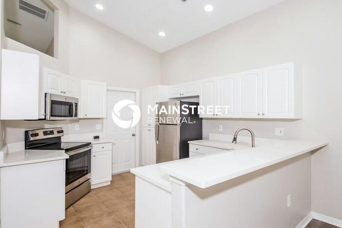 9310 27th Ave E - Photo 5 of 16