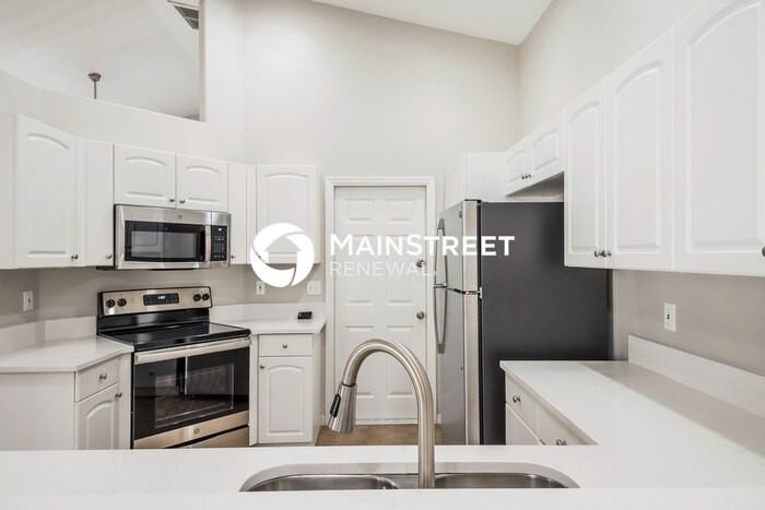 9310 27th Ave E - Photo 6 of 16