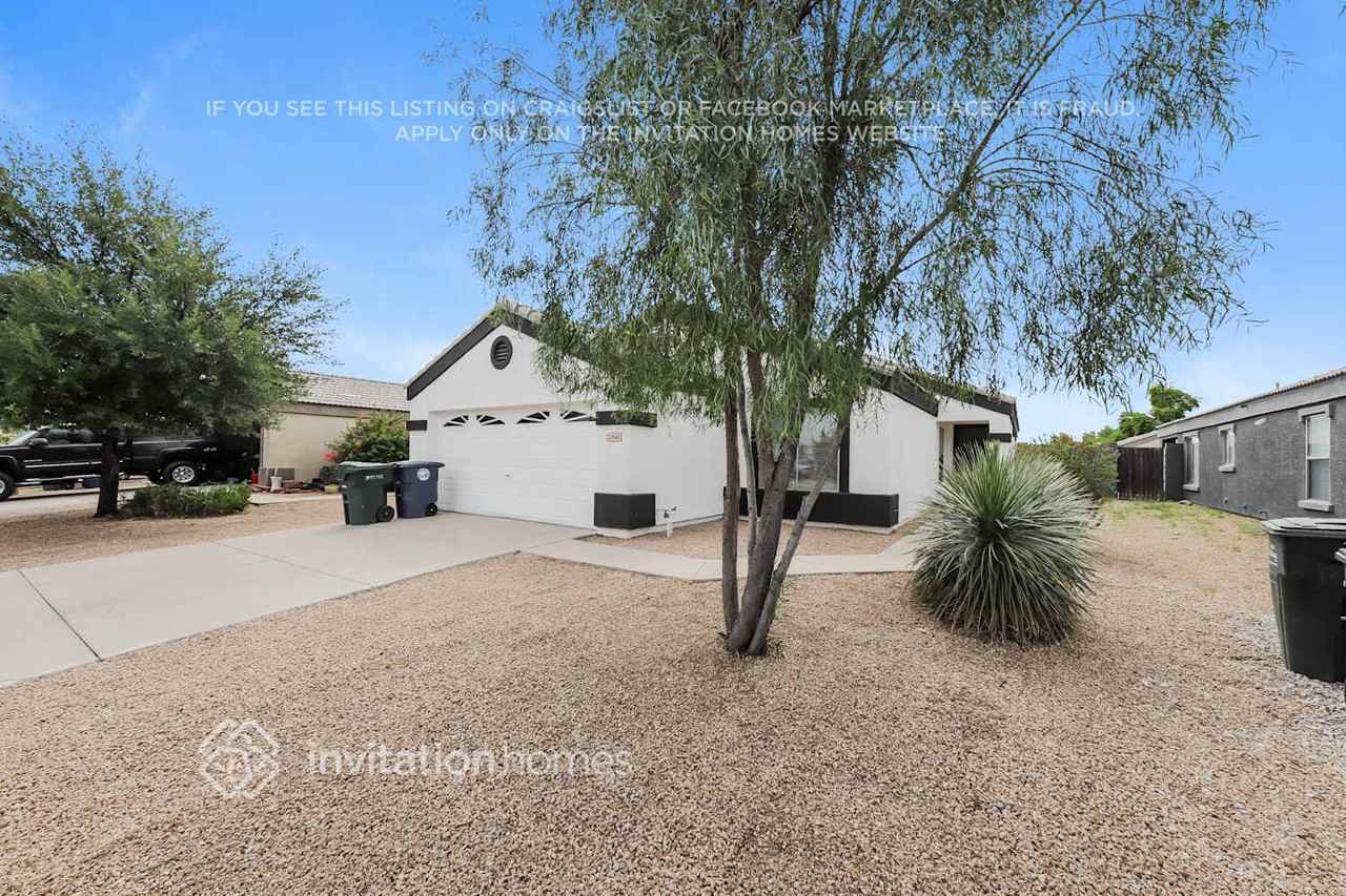 12845 W Myer Ln - Photo 2 of 16