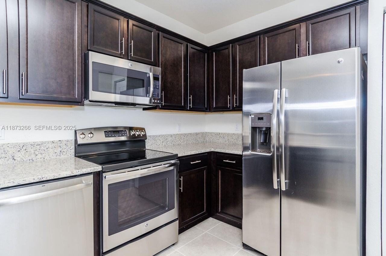 10630 Northwest 88th Street ##202 - Photo 5 of 20