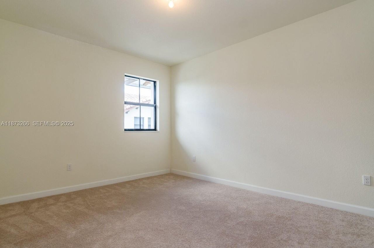 10630 Northwest 88th Street ##202 - Photo 7 of 20