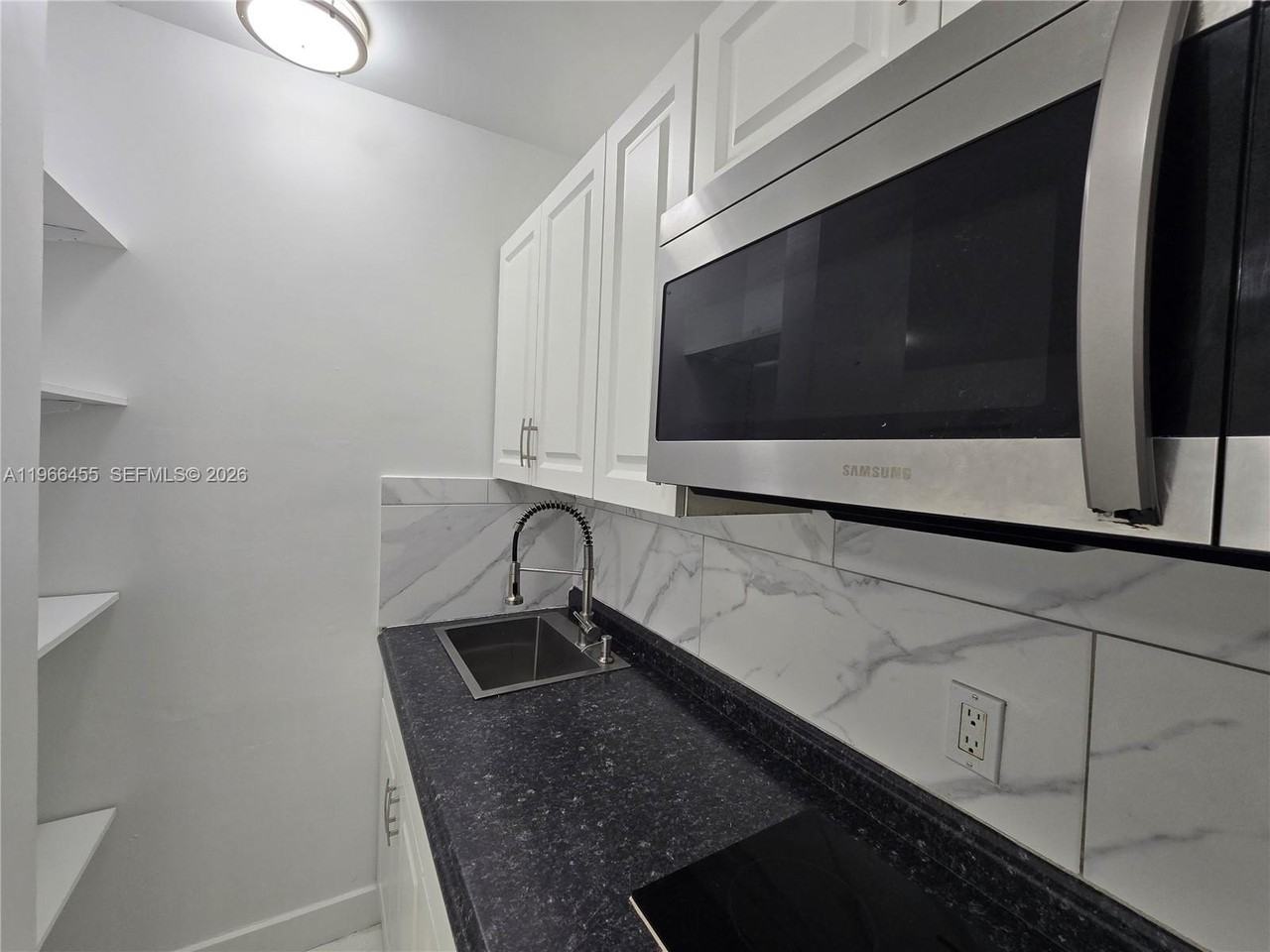 1230 Nw 70th St - Photo 3 of 11