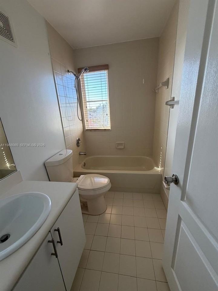 7100 Nw 177th St #210-14 - Photo 3 of 6