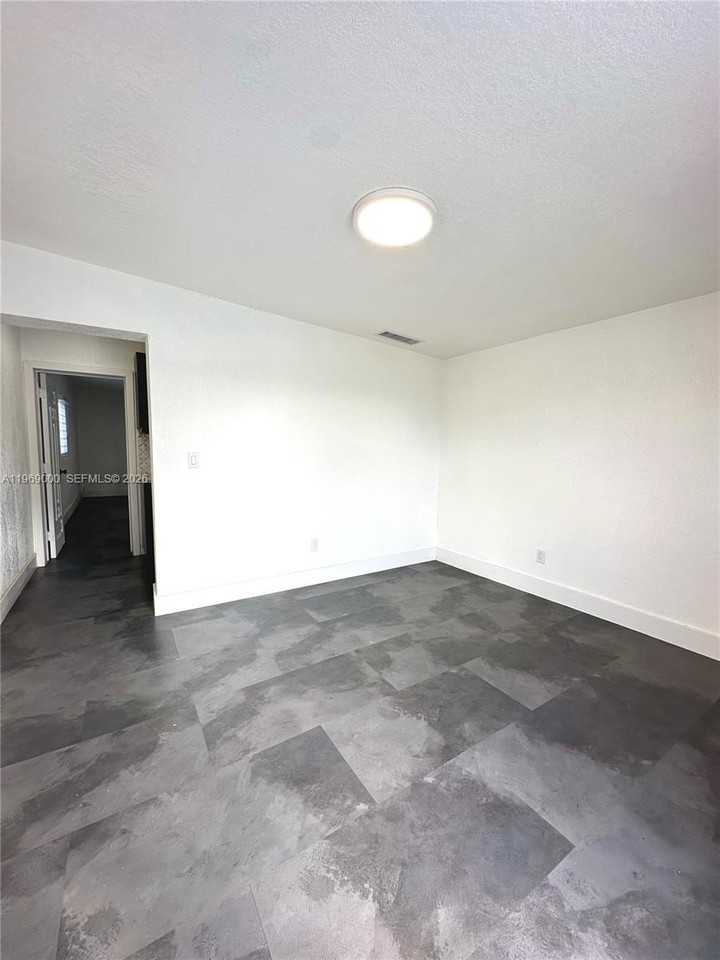 1960 W 63rd St - Photo 3 of 12